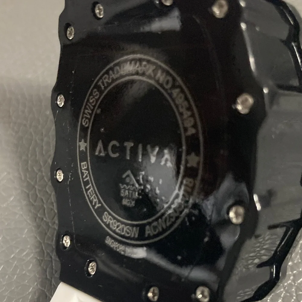 Activa Watch w/ Skeleton Dial 44.3mm, White strap black face (ACW2305-018)